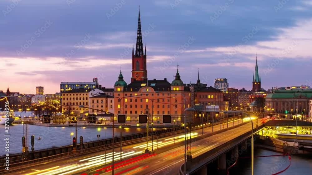 Stockholm, Sweden. Time-lapse of Gamla Stan in Stockholm, Sweden with landmarks like Riddarholm Church during the sunset. View of old buildings and car traffic at the bridge, panning video