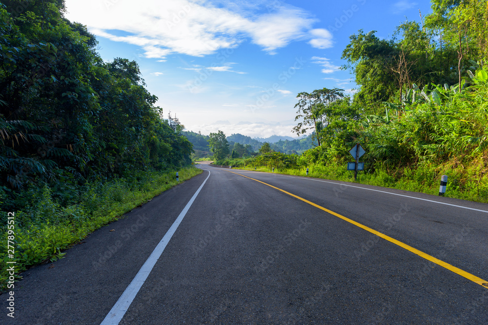 Fototapeta premium Asphalt road side view and landscape countryside.