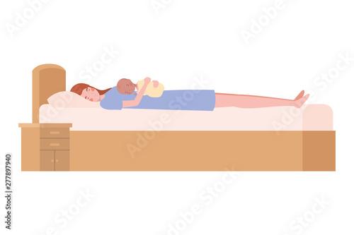 young woman with newborn baby in bed