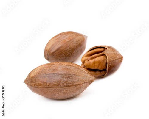 Fresh pecan nuts isolated on a white background