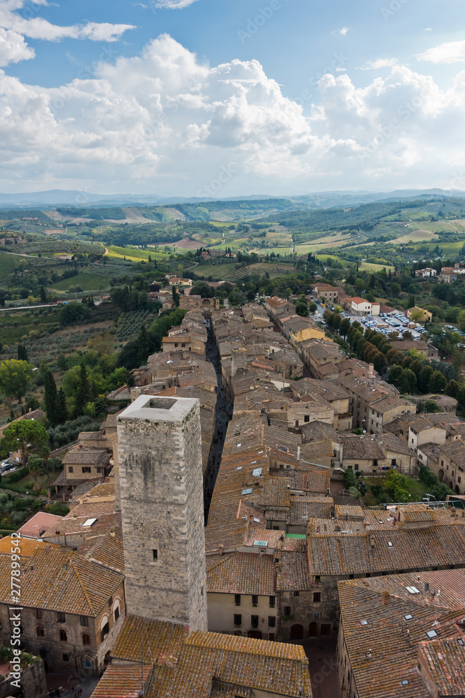Obraz premium Panoramic aerial view of the city and surrounding countryside from the towers of San Gimignano in Tuscany, Italy