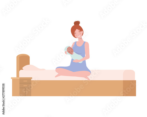 young woman with newborn baby in bed