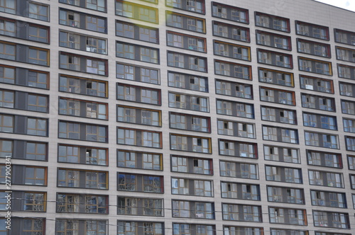 Corner of a modern residential building against the sky.