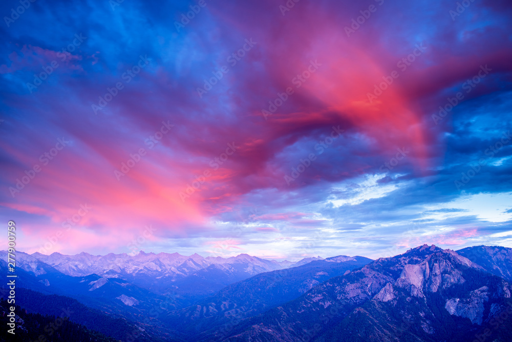 Dramatic Pink Storm Clouds Above High Sierra Peaks at Sunset
