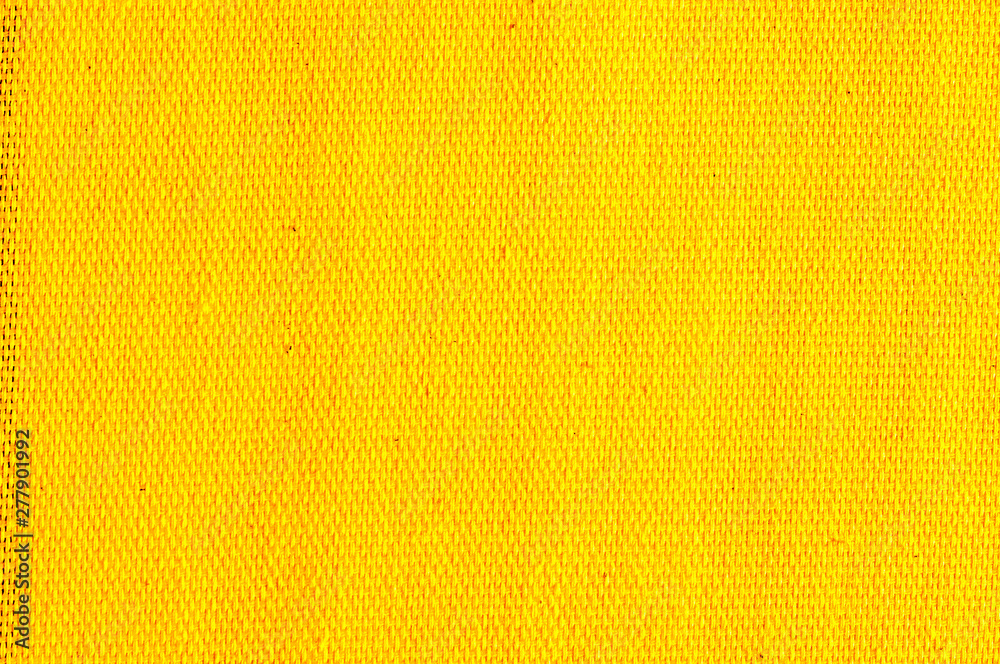 Textured yellow natural fabric Textured yellow natural fabric