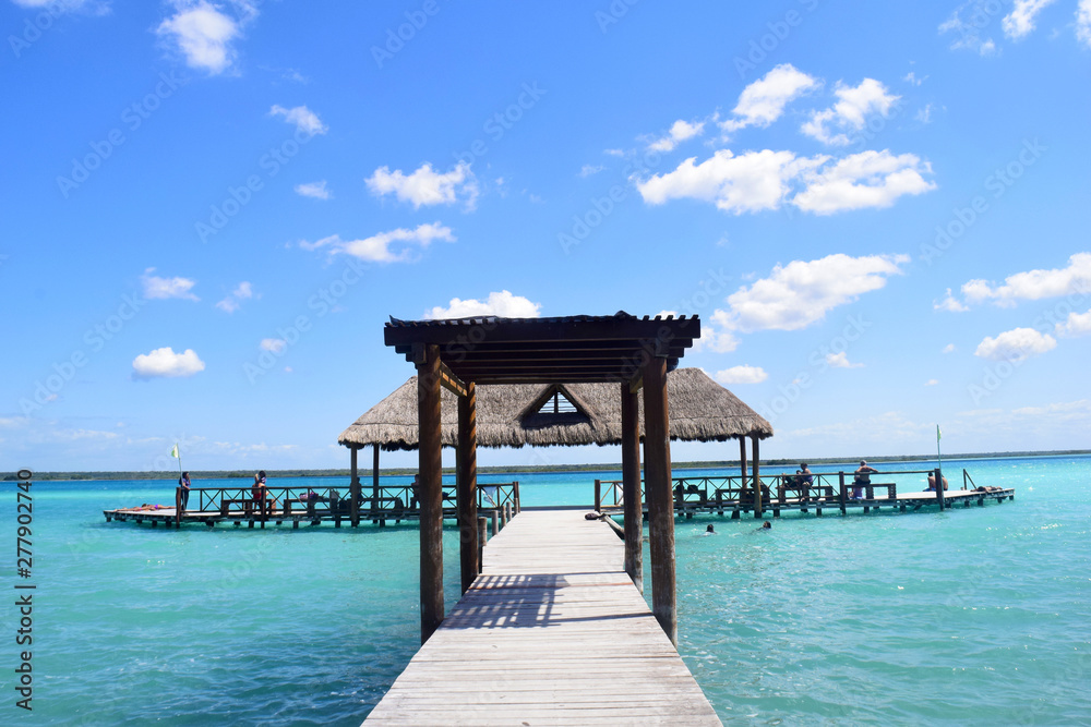 SWIMMING DOCK IN BACALAR LAGOON, RIVIERA MAYA MEXICO SWIMMING DOCK IN BACALAR LAGOON, RIVIERA MAYA MEXICO
