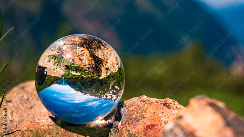 Crystal ball alpine landscape shot at the famous Grossglockner High Alpine Road, Salzburg, Austria