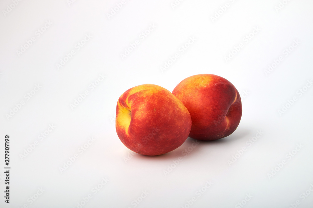 Ripe juicy nectarines isolated on white background Ripe juicy nectarines isolated on white background