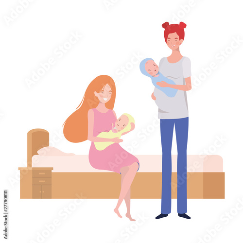 young couple in the bed with a newborn baby