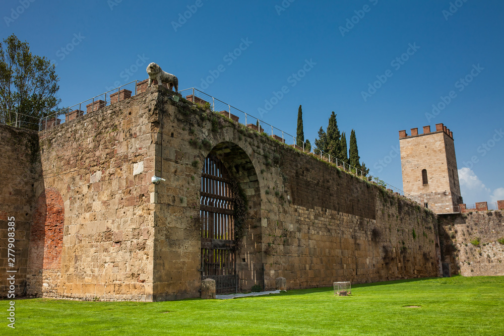 Gate of the Lion and the Saint Mary Tower at the ancient walls of Pisa Gate of the Lion and the Saint Mary Tower at the ancient walls of Pisa