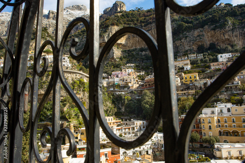 Positano on the Amalfi coast, Italy in wintertime with a mountain range in the background covered with snow