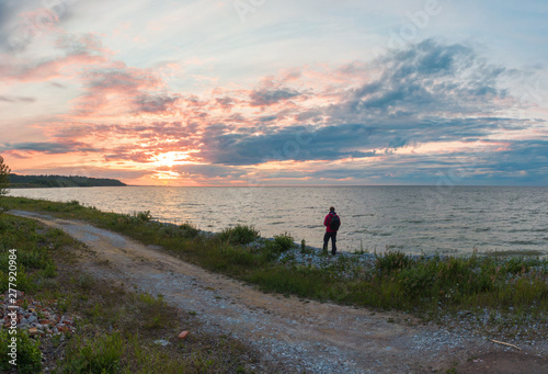 man at sunset by the sea.