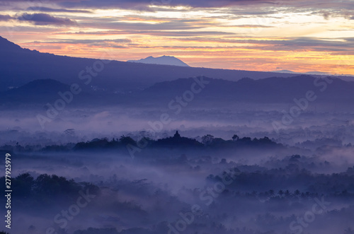 foggy morning Borobudur Budhist Temple java Indonesia