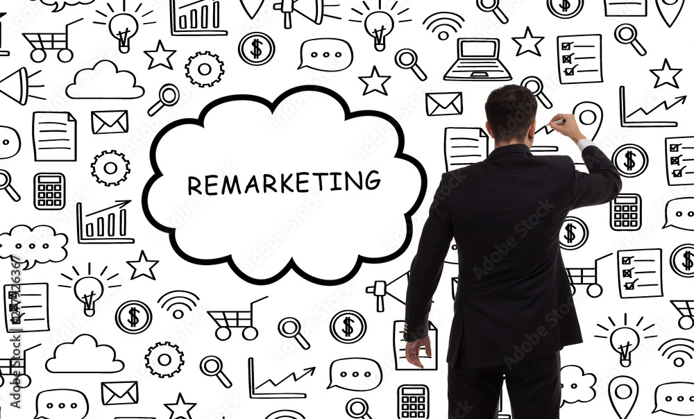 Business, technology, internet and networking concept. Young entrepreneur showing keyword: Remarketing Business, technology, internet and networking concept. Young entrepreneur showing keyword: Remarketing