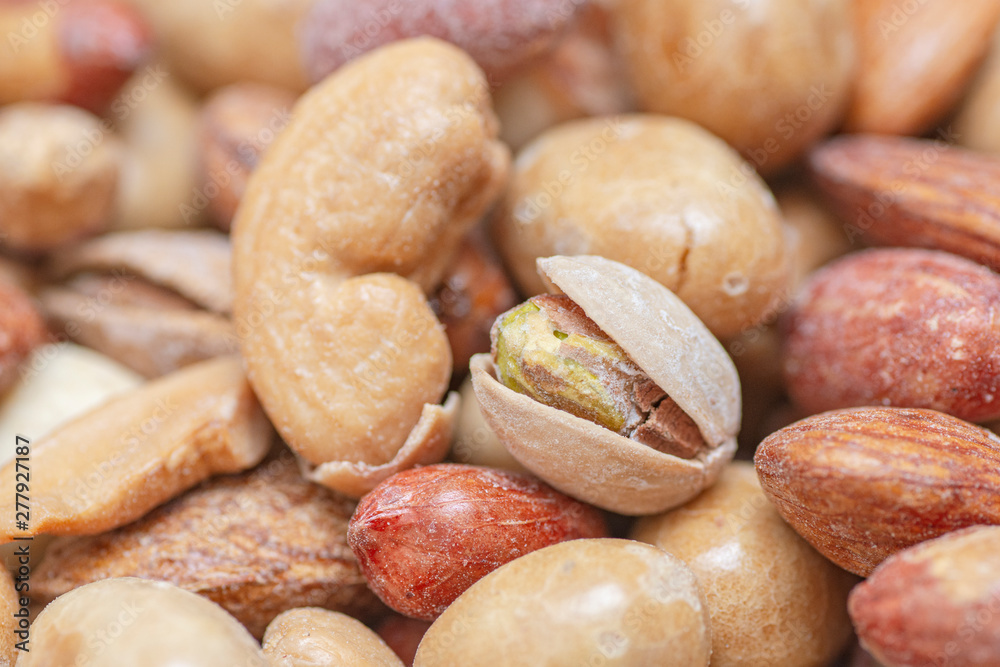 Natural background made from different kinds of nuts Natural background made from different kinds of nuts