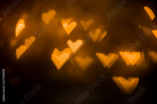 beautiful background of golden hearts. garland lights