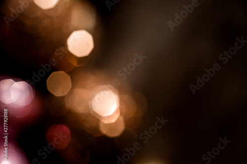 Christmas background, bokeh in dark colors, bokeh in purple and gold colors © КРИСТИНА Игумнова