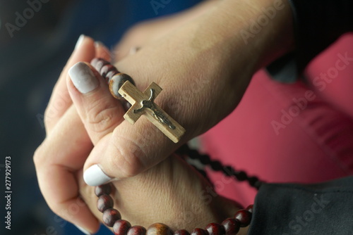 rosary in women's hands
