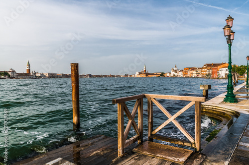 Wooden pier on the Venetian canal