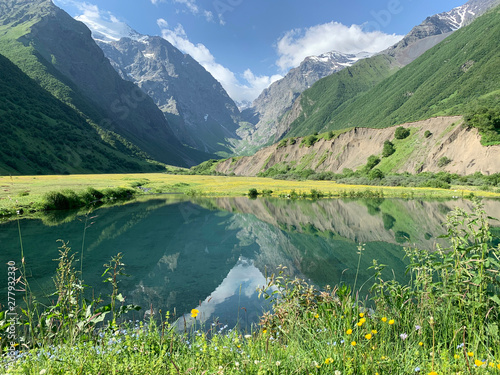 Russia, North Ossetia. Midagrabin (Midagrabinskoe) lake in the mountains in summer photo
