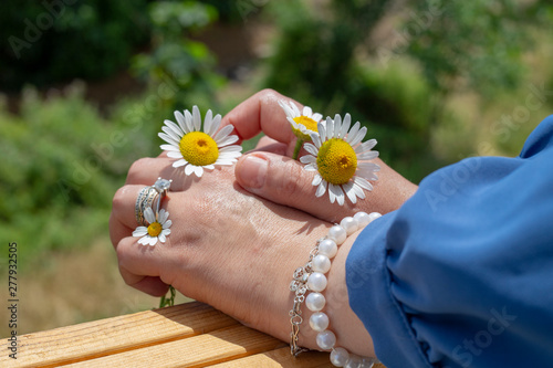 woman holding flowers