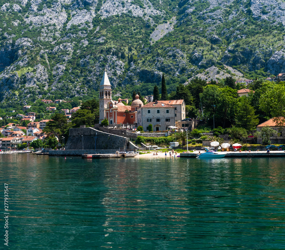 Fototapeta premium Fragment of Kotor Bay with houses on shore, Montenegro