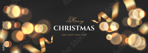 Merry Christmas vector luxury banner design. Black golden background with flying gold confetti. Elegant festive decoration, long panoramic gift card or wide web layout template