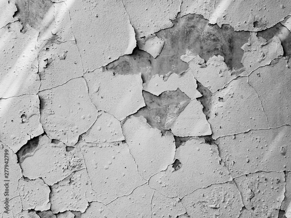 Fototapeta premium The walls of the house, covered with old paint, natural lighting.