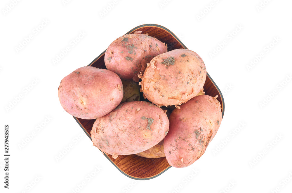 Fresh red potatoes in a bowl isolated on white background. The view from the top. Background of organic food. Fresh red potatoes in a bowl isolated on white background. The view from the top. Background of organic food.