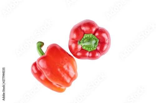 Fresh peppers isolated on white background. The view from the top. Background of organic food.