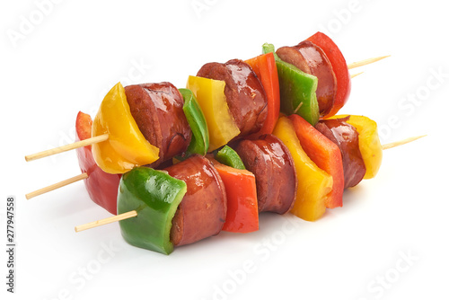 Shish Kebab - grilled pork bratwurst sausage skewers and vegetables BBQ, close-up, isolated on white background