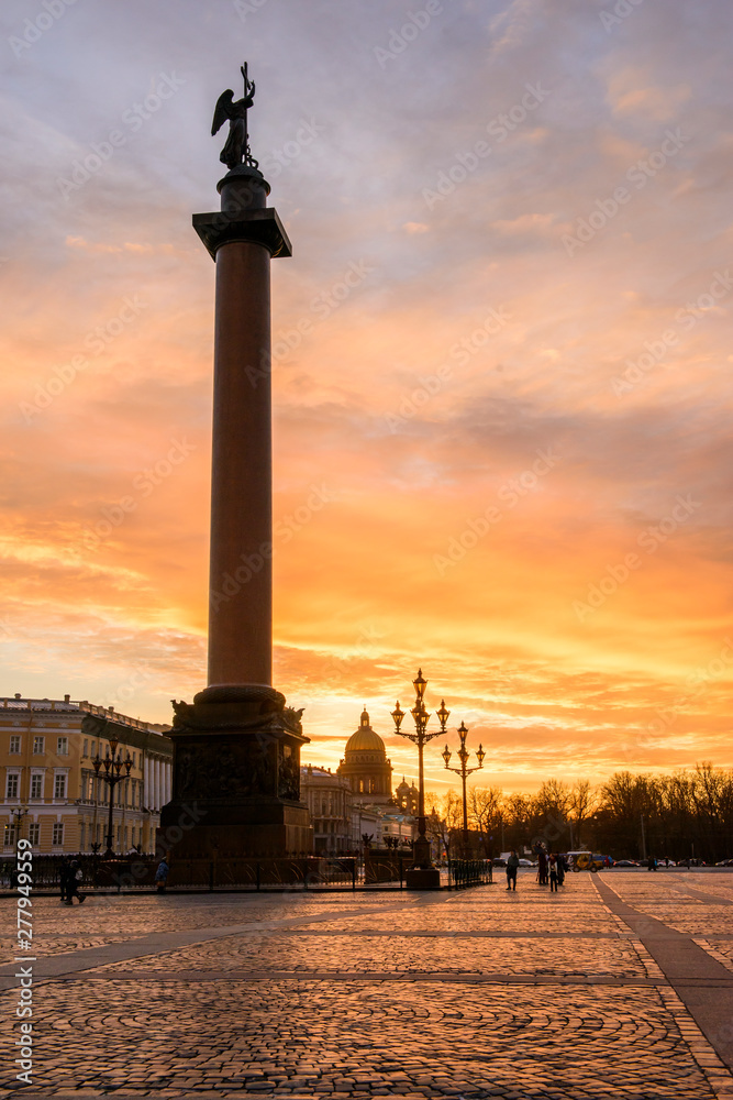 Sunset on the Palace Square in St. Petersburg, a golden sunset overlooking St. Isaac's Cathedral