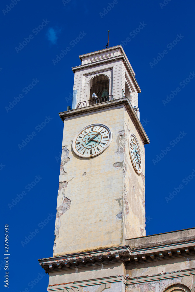Clock tower of the historical Palazzo Gambacorti built on the 14th century