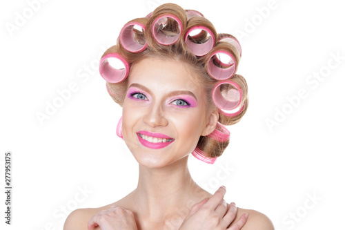 Tableau sur toile portrait of beautiful woman with hair curlers
