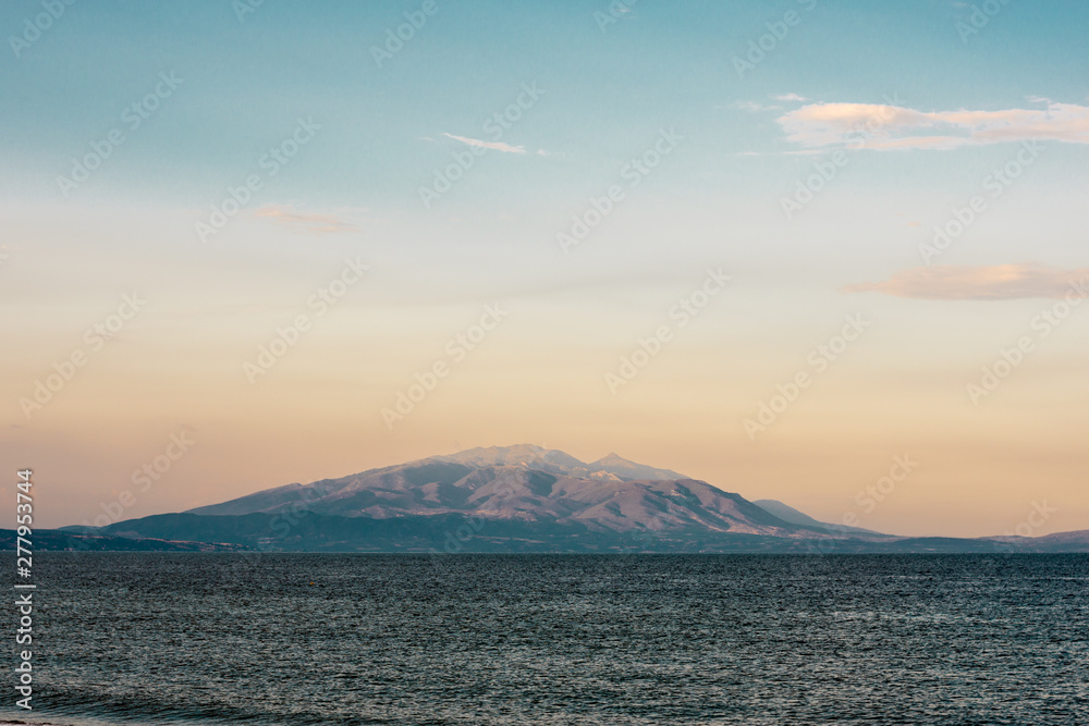 Sunset at the seaside, sea, mountains, sky