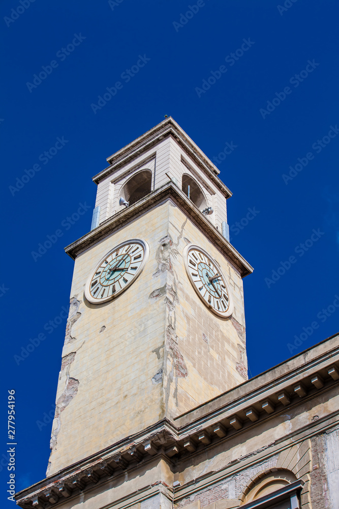 Clock tower of the historical Palazzo Gambacorti built on the 14th century