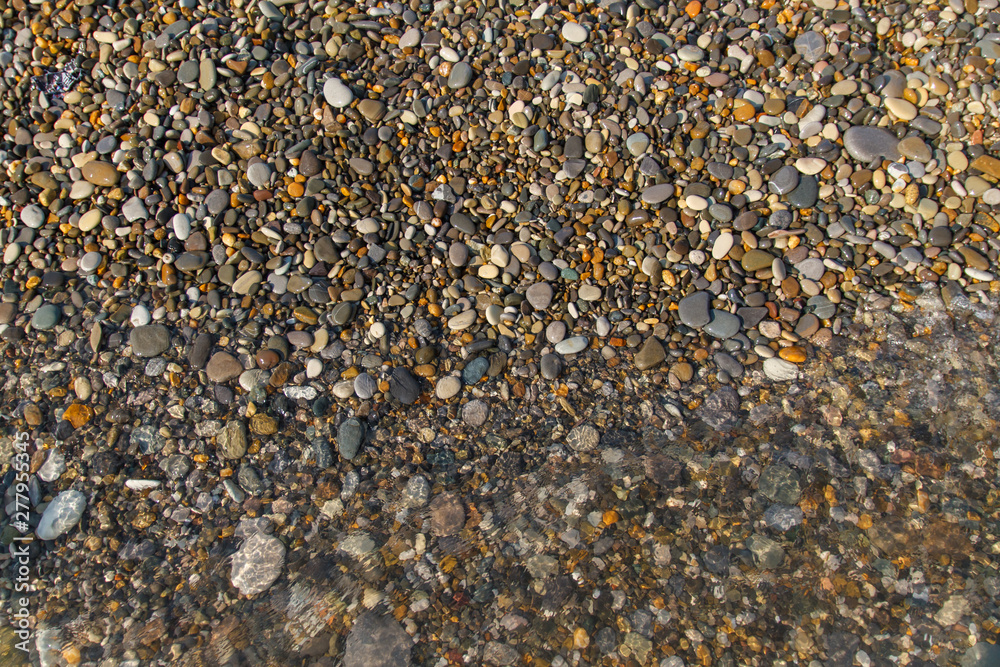 Abstract background with stones. Pebbles, coast. Abstract background with stones. Abstract background with stones. Pebbles, coast. Abstract background with stones.