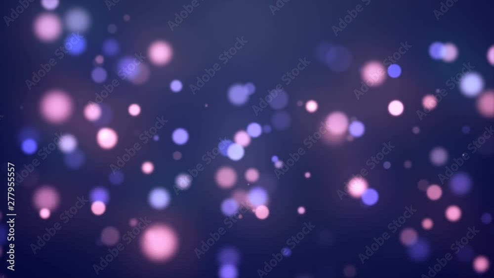 4K Abstract Christmas festive blue and violet motion background with defocused round glowing bokeh lights. Particle shine. Xmas 2020