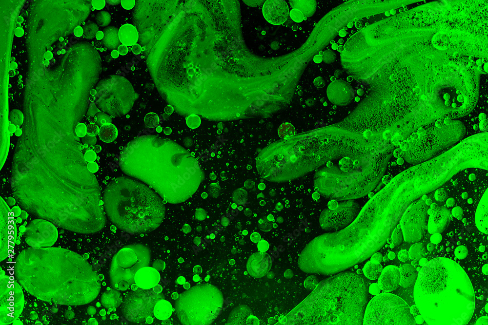 Obraz premium Green liquid bubbles abstract background. Macro photography