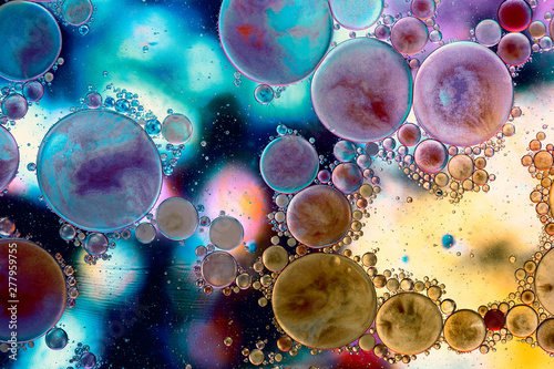Colourful liquid bubbles abstract background. Macro photography