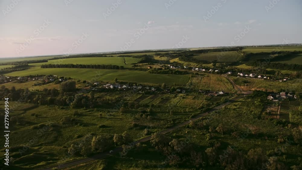 Aerial Evening Sunshine View Of Field and trees Aerial Evening Sunshine View Of Field and trees