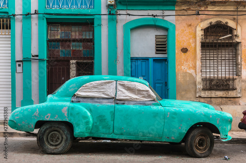 Parked damaged vintage car, Havana, Cuba