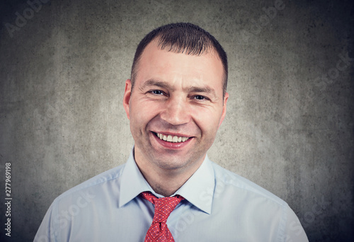 Closeup of a happy smiling business man