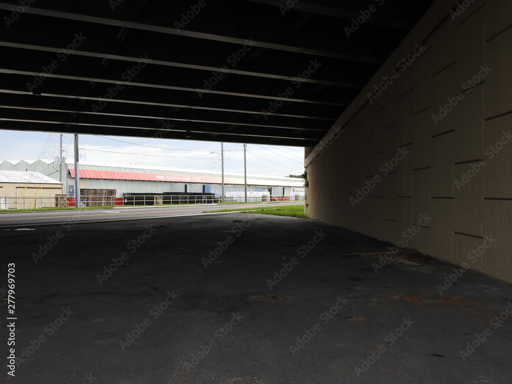 The underside of a bridge with a building in the background in Apopka in Florida! The underside of a bridge with a building in the background in Apopka in Florida!