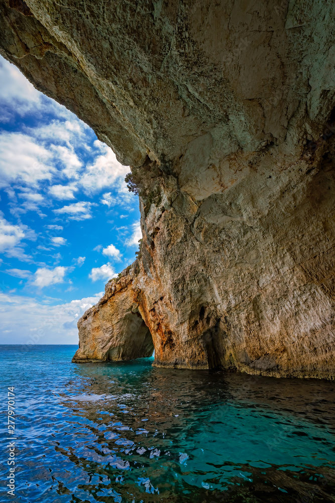 Stone arch entrance to one of Blue Caves