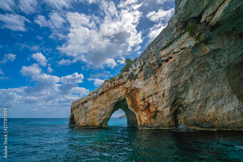 Stone arch entrance to one of Blue Caves
