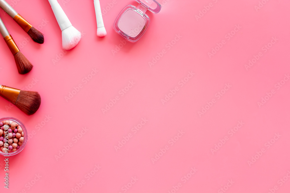 Instruments for make up with brushes, blusher on pink background top view mock up