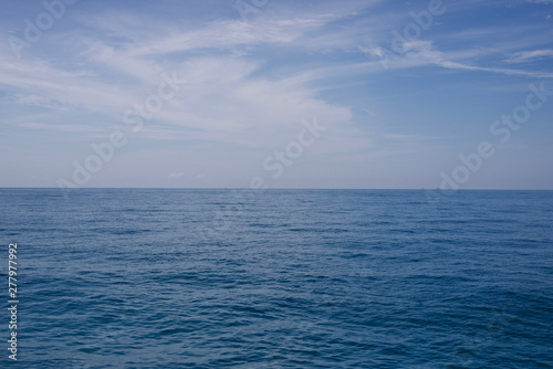 Beautiful blue ocean and soft sky background © tonguy324