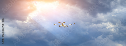 Canvas Print Commercial airplane flying in the sky