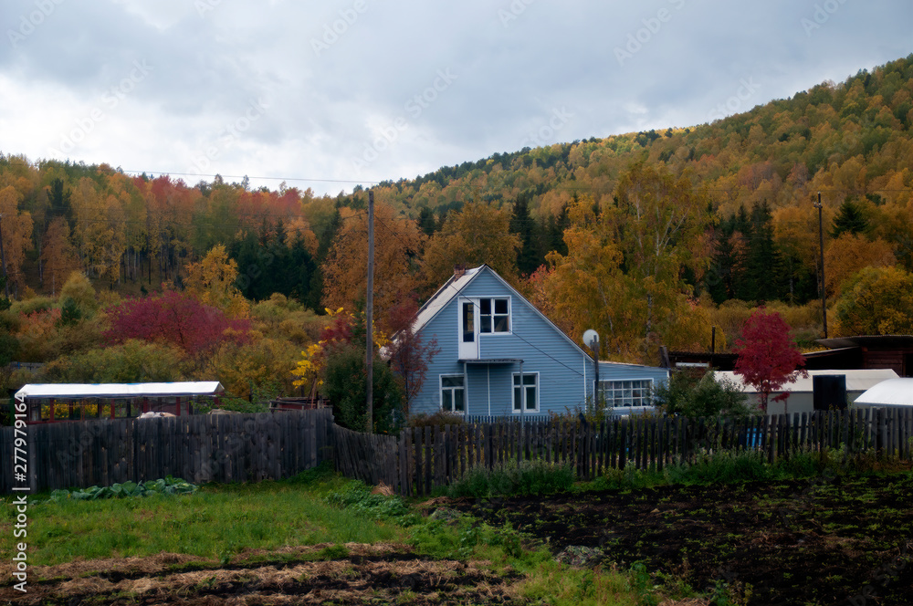 Siberia Russia, autumn scene of farmhouse from train Krasnoyarsk and Irkutsk